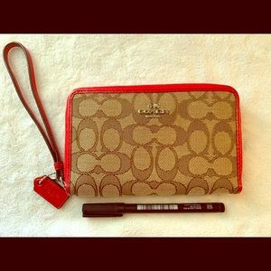 Coach Signature monogram wristlet NWOT